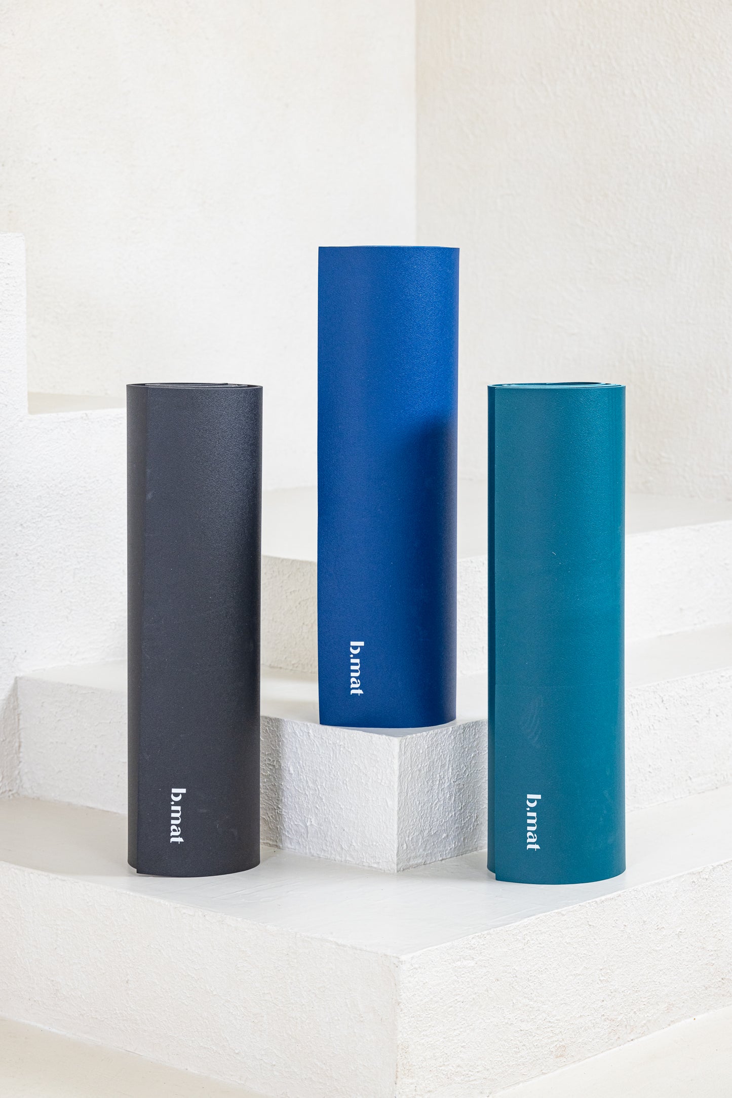 Blue, Black and Black Bmat Yoga mats