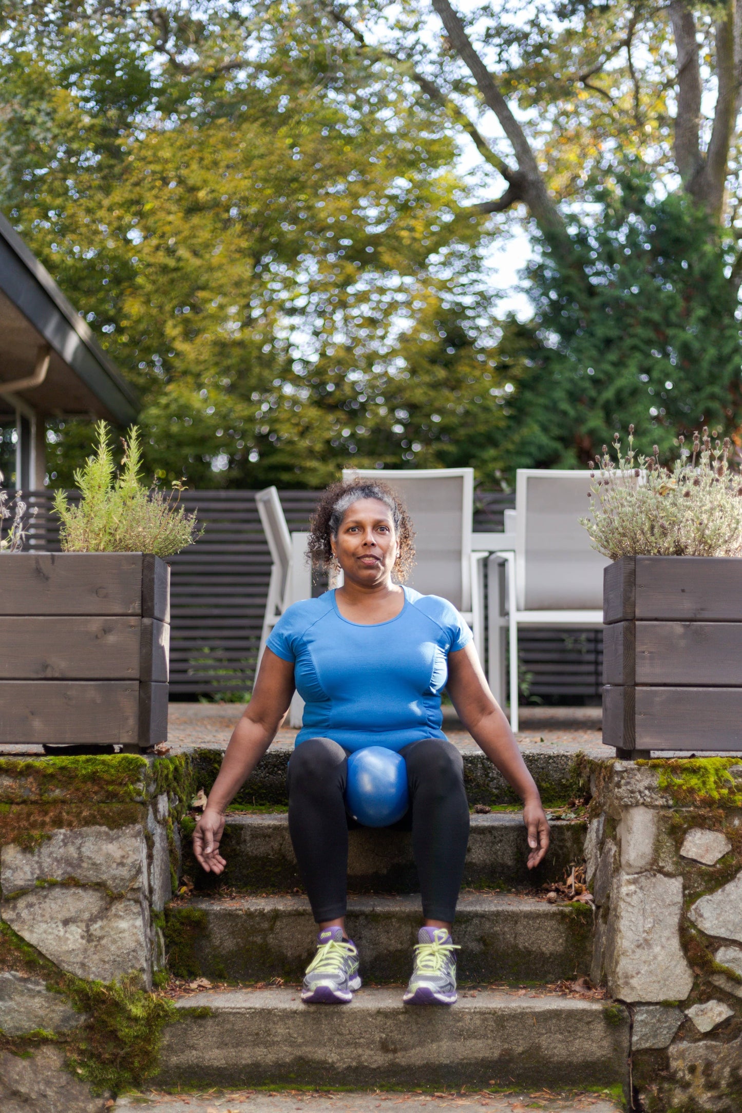 Women Showing how to use a pilates ball for lower body strength