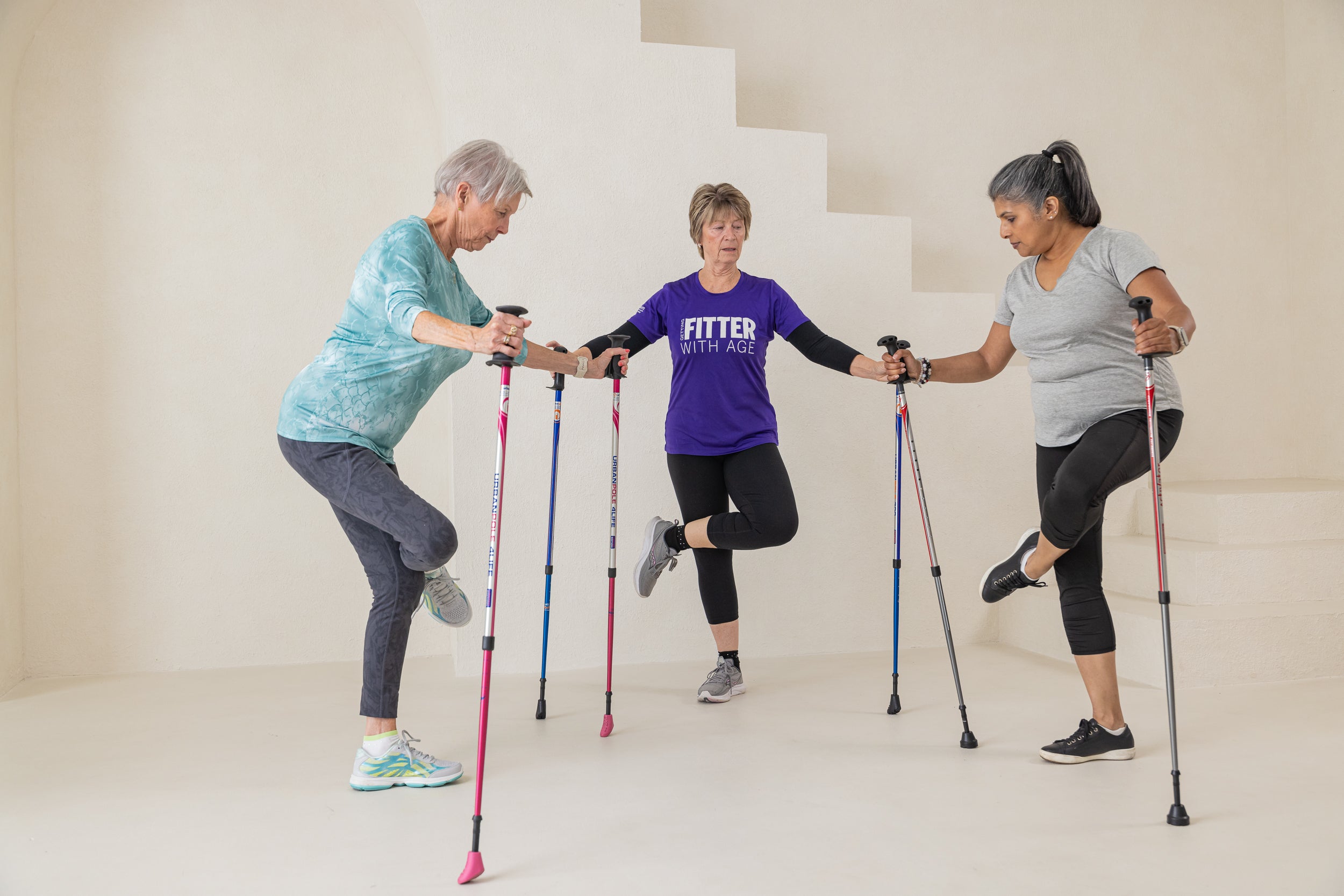 Women Using Urban Poles to Exercise