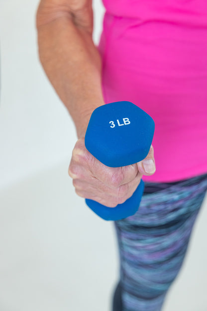 Older women holding weights